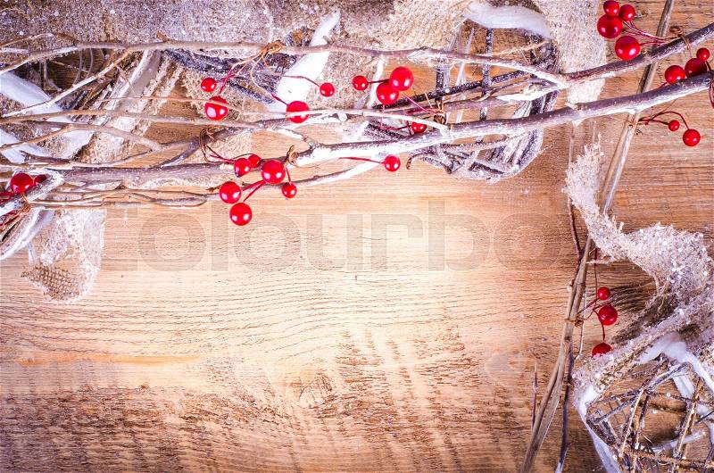 Christmas rustic light boxes on wooden background, snowy wreath. Christmas and New Year decoration frame. Free space for text, stock photo