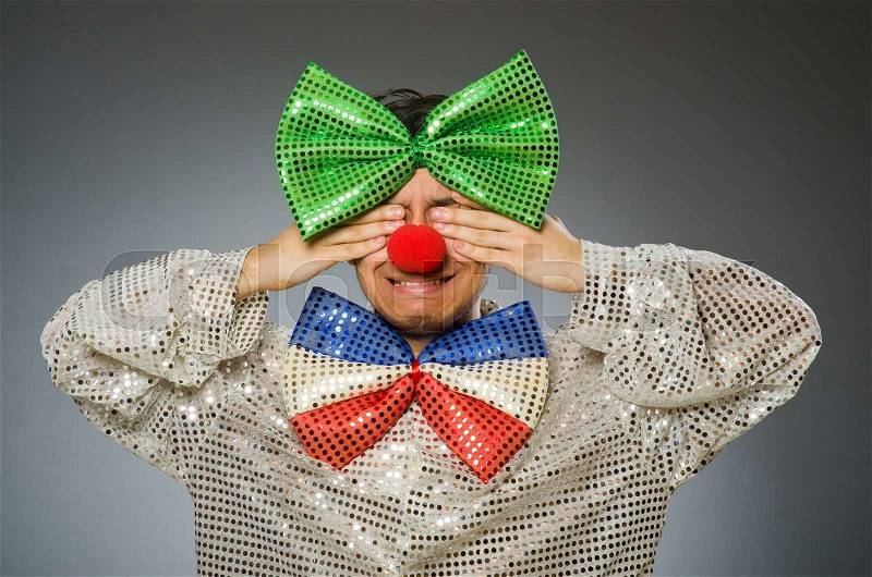 Funny clown with red nose, stock photo