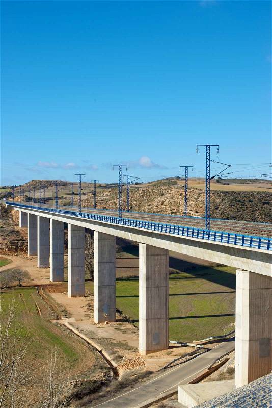 View of a high-speed viaduct in Alconchel de Ariza, Saragossa, Aragon, Spain. AVE Madrid Barcelona, stock photo