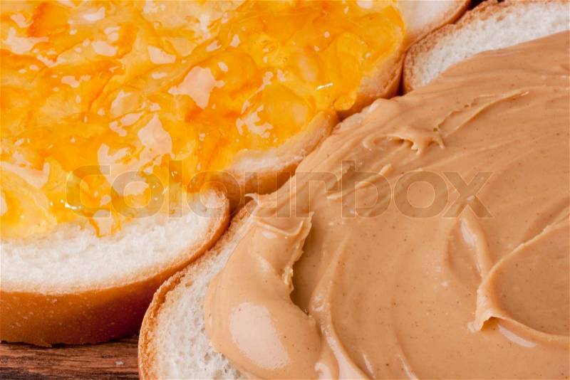Two pieces of bread with Peanut butter and sweet jam, stock photo