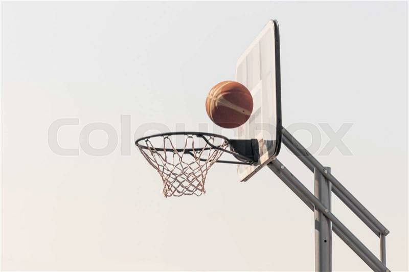 Ball into the basketball net, stock photo