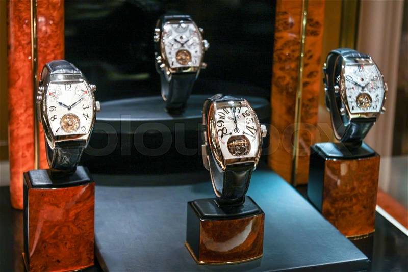 Swiss watches on stand. Men fashion. Men or women accessories. Selective focus, stock photo