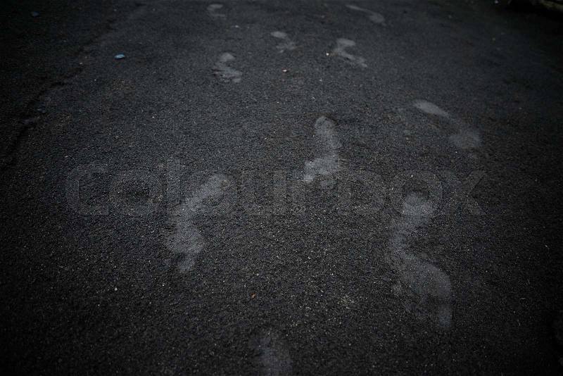 Human footprint in wet soil, stock photo