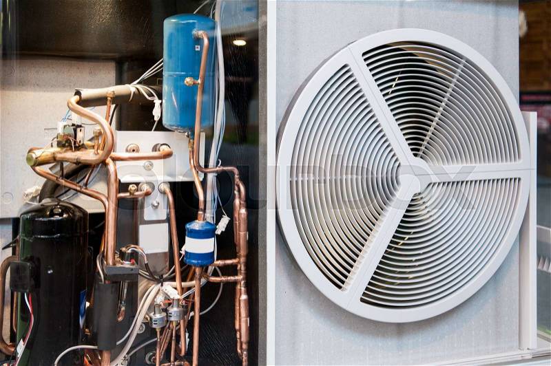Seen through heating and AC air conditioning unit used in a residential home or business office, stock photo