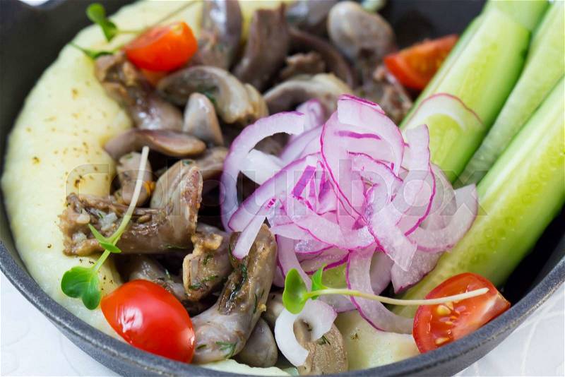 Mashed potatoes with mushrooms and onions cucumber, stock photo