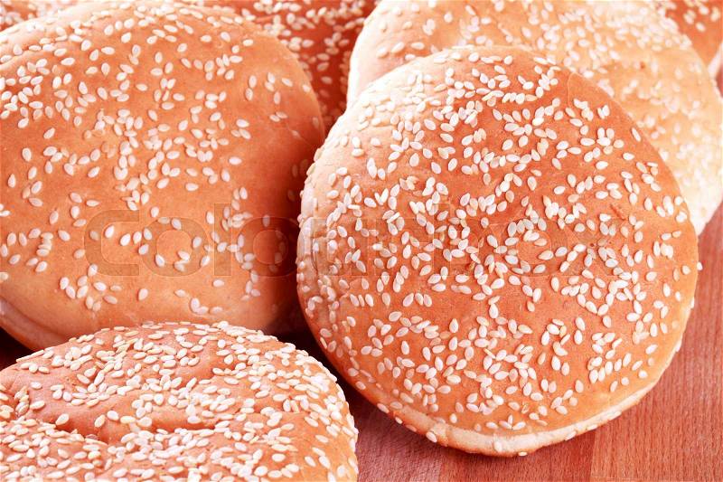Hamburger buns with sesame seeds on top, stock photo
