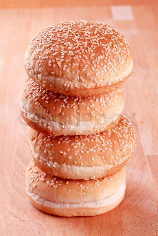 Hamburger buns with sesame seeds on top, stock photo