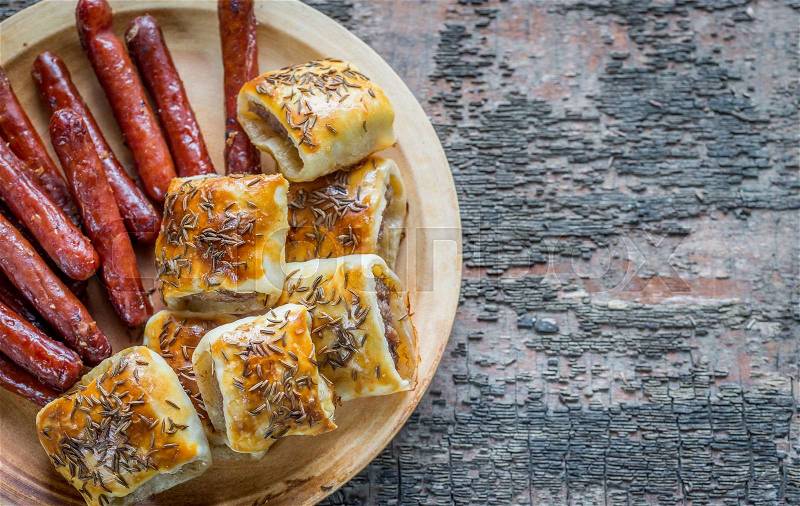 Grilled sausages and sausage rolls, stock photo