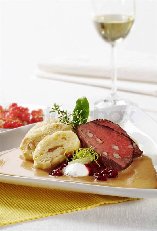Sirloin of beef with cream sauce and bread dumplings\, stock photo