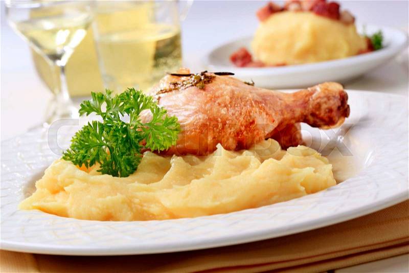 Roasted chicken and mashed potato - closeup, stock photo