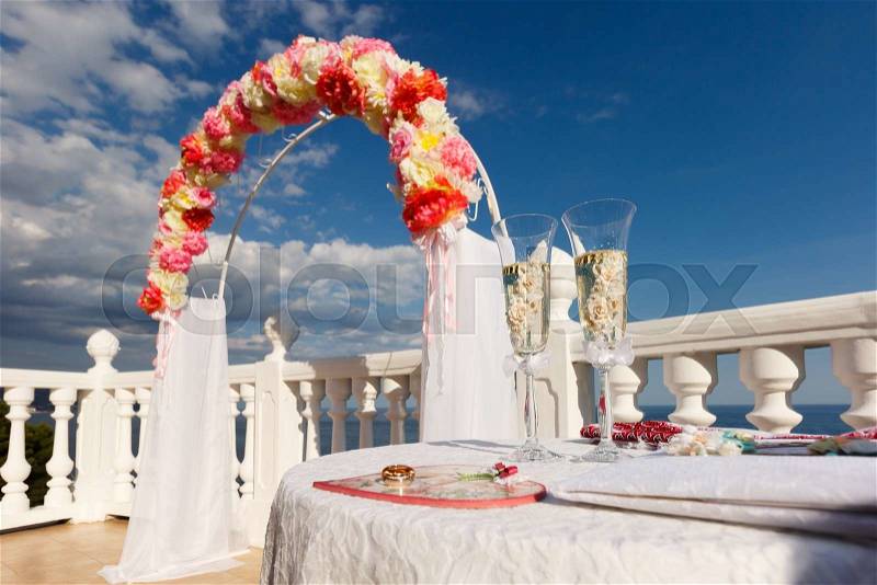 Wedding glasses with sparkling wine during event, stock photo