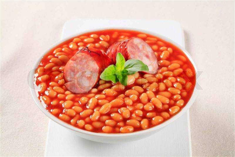 Baked beans with grilled sausage, stock photo