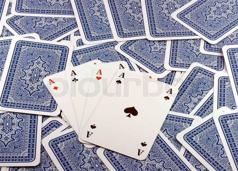 Four Aces in Background scattered Playing Card Back , stock photo