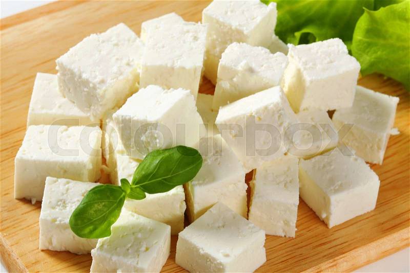 Cubes of feta cheese on a plate, stock photo