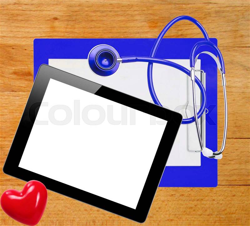 Digital tablet, stethoscope and blue clipboard over wooden background, stock photo
