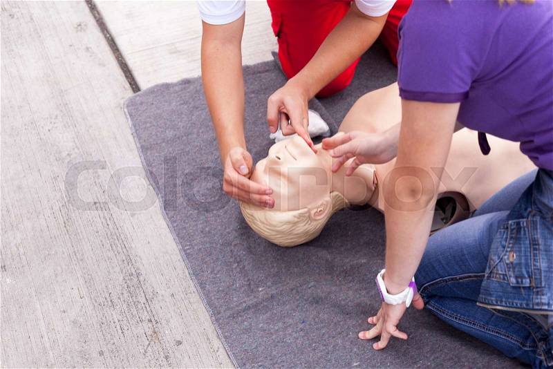 Cardiopulmonary resuscitation (CPR). First aid training, stock photo