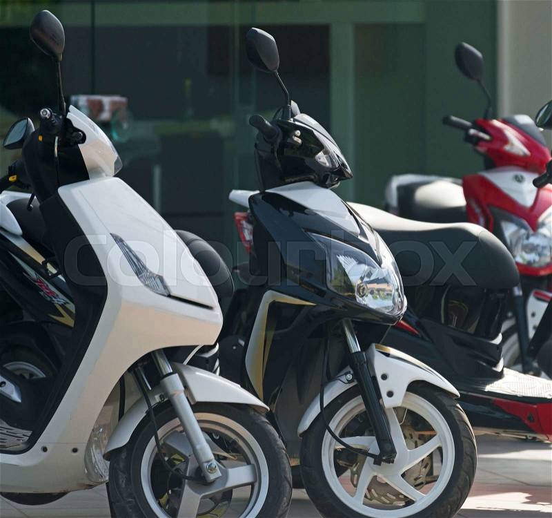 Scooter motorbikes rent on the street, stock photo