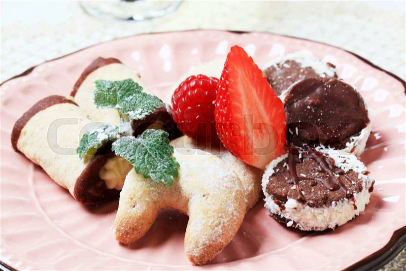 Mini dessert cookies on a plate, stock photo