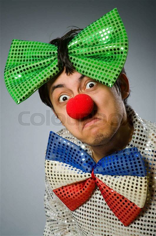 Funny clown with red nose, stock photo