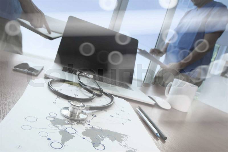 Team doctor working with laptop computer in medical workspace office and medical network media diagram as concept, stock photo