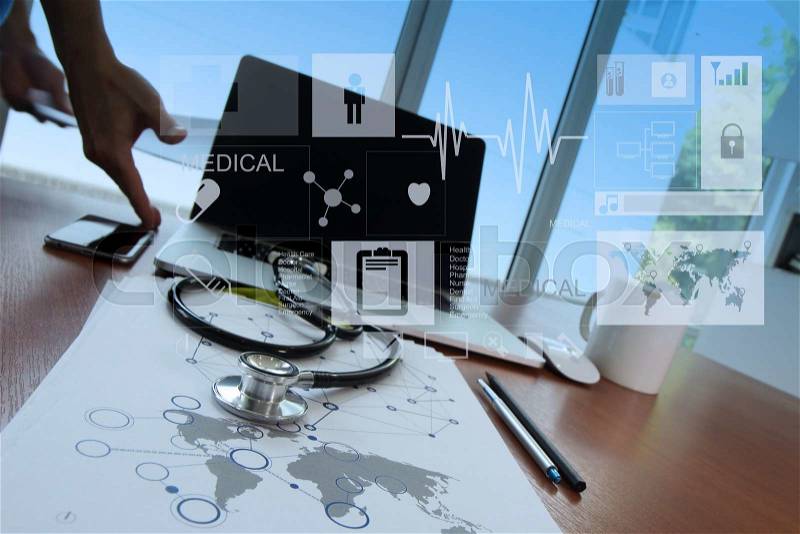 Doctor working with digital tablet and laptop computer in medical workspace office and medical network media diagram as concept, stock photo