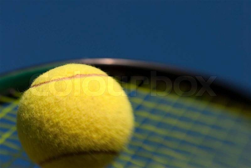 Close-up copy space tennis with yellow ball and racket, stock photo