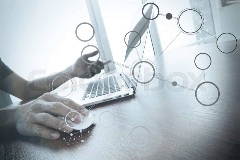Doctor working with laptop computer in medical workspace office and medical network media diagram as concept , stock photo