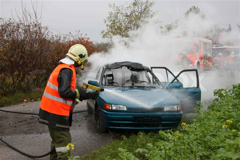 Training of rescue and fire units in accident with car, stock photo