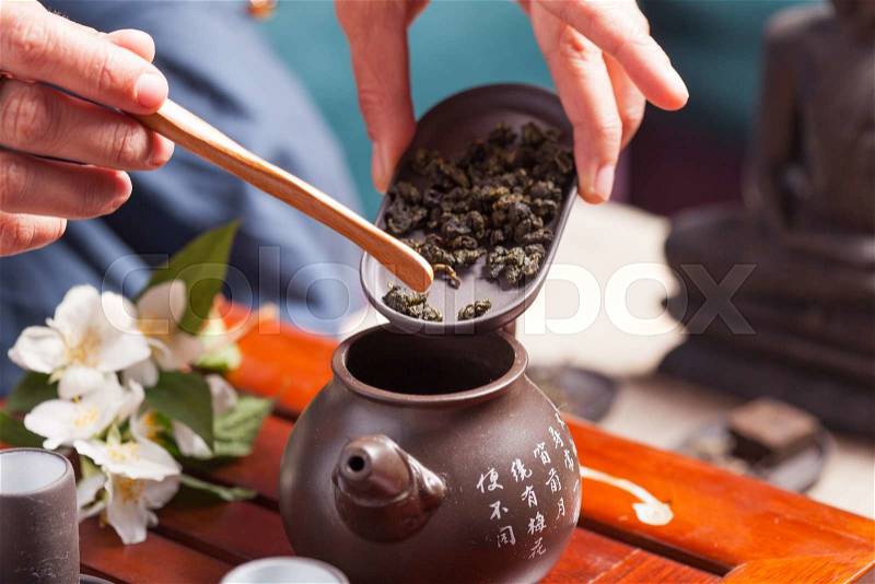 Chinese tea ceremony - sands of oolong tea, stock photo