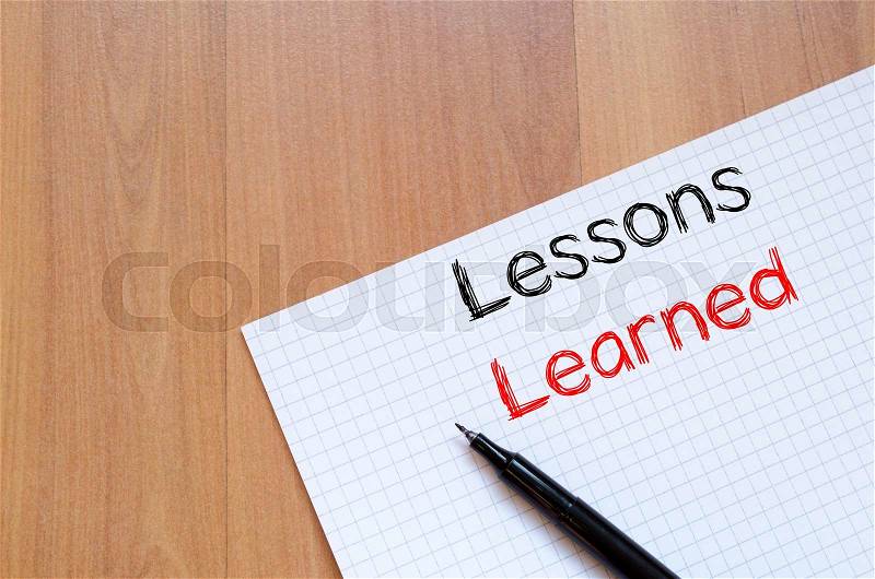 Lessons learned text concept write on notebook, stock photo