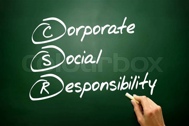 Hand drawn Corporate Social Responsibility (CSR), business concept acronym on blackboard, stock photo