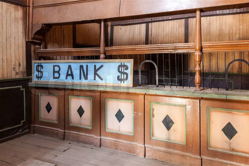 Old abandoned bank building in an american ghost town, stock photo