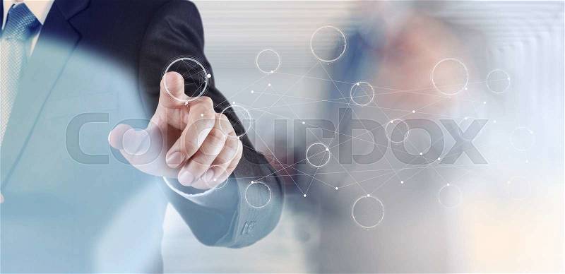 Businessman hand drawing blank flow chart on new modern computer as concept , stock photo
