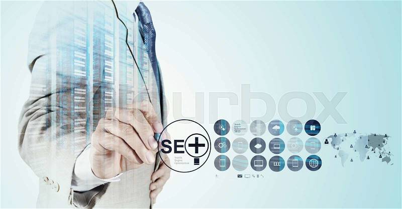 Double exposure of businessman hand showing search engine optimization SEO as concept , stock photo