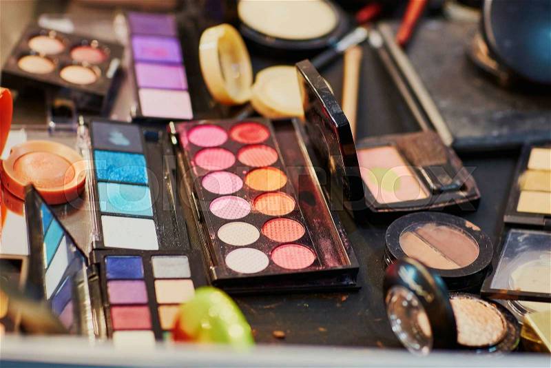 Beauty products in a makeup artist case, stock photo