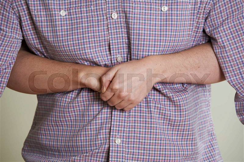 Close Up Of Woman Demonstrating Heimlich Maneuver In First Aid Class, stock photo