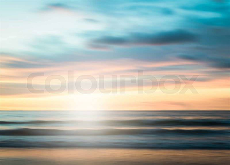 An abstract seascape with blurred panning motion with cross-processed colors background, stock photo