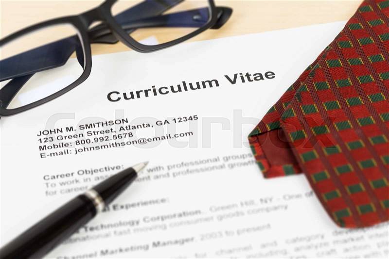 Curriculum vitae or CV with pen, glasses, and neck tie; CV and information are mock-up, stock photo