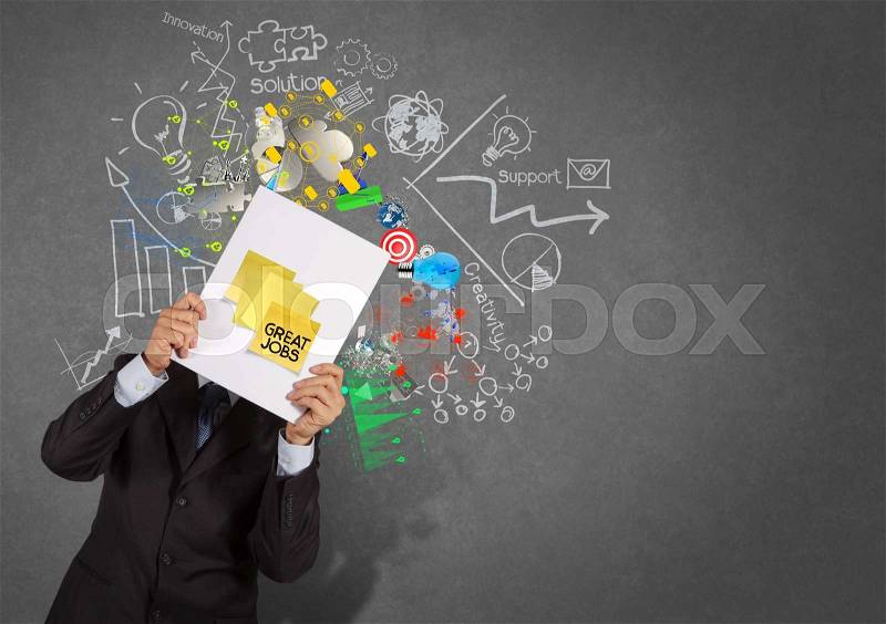 Businessman show great jobs on sticky note with book business strategy texture background as concept, stock photo