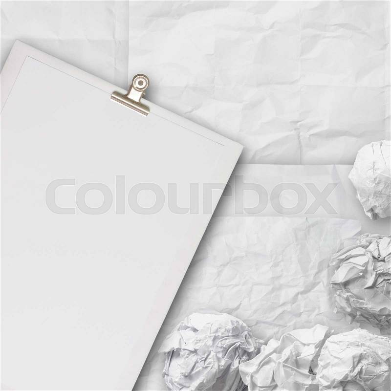 Composition of white crumpled paper background texture and blank book, stock photo