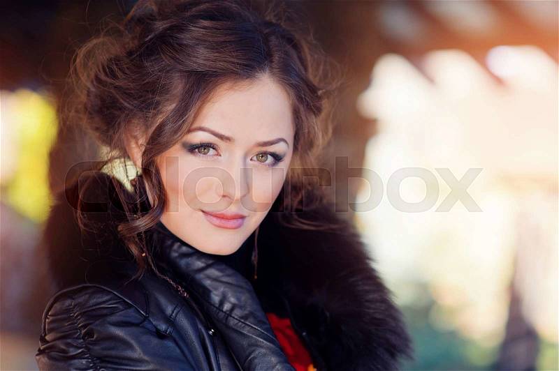 Portrait of a beautiful woman staring at the camera, stock photo