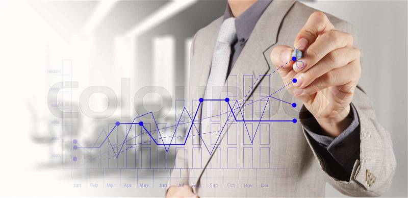 Businessman hand draws business success chart concept on virtual screen, stock photo