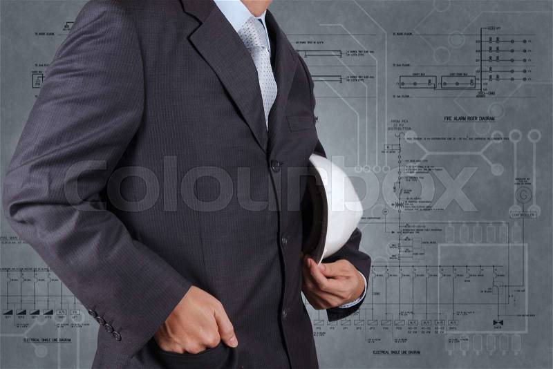 Smart engineer and electrical diagram background as concept, stock photo