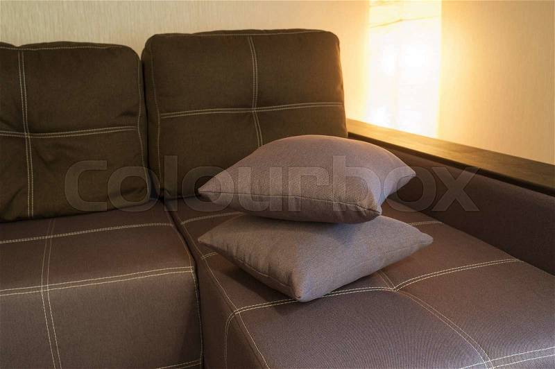 Brown included a sofa and a lamp in the room, stock photo