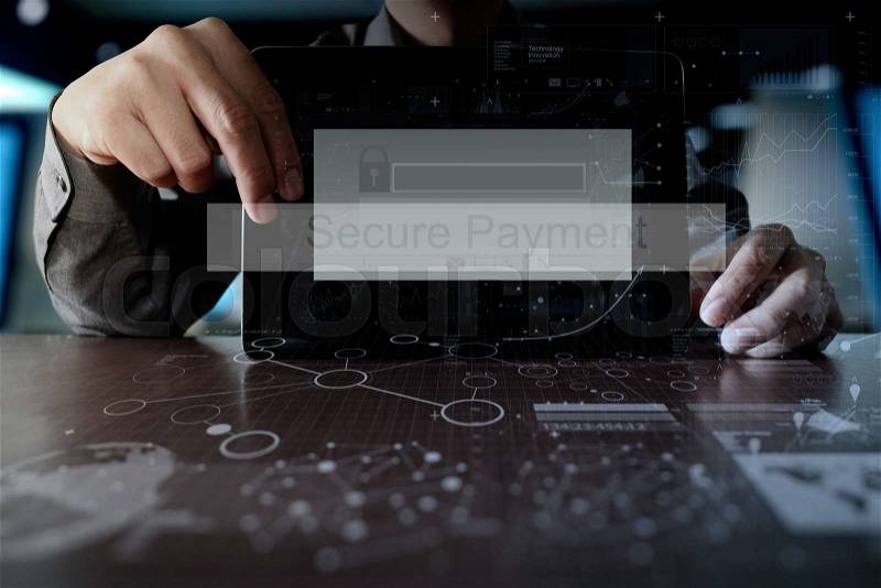 Hands using laptop and holding credit card with \