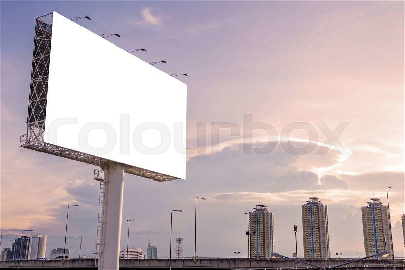 Large blank billboard on building in city view background, stock photo