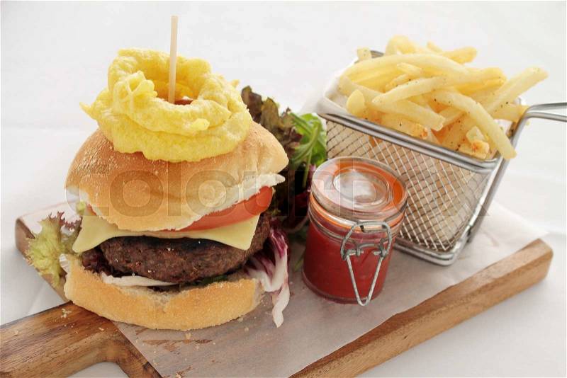 Gourmet burger plated meal, stock photo