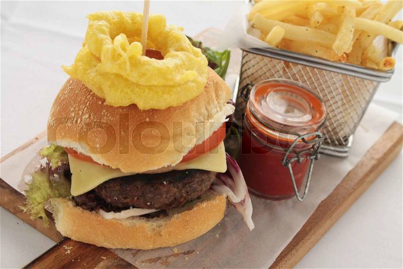 Gourmet burger plated meal, stock photo