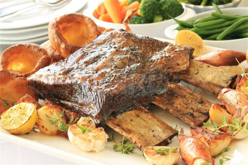 Large beef rib sunday roast dinner, stock photo
