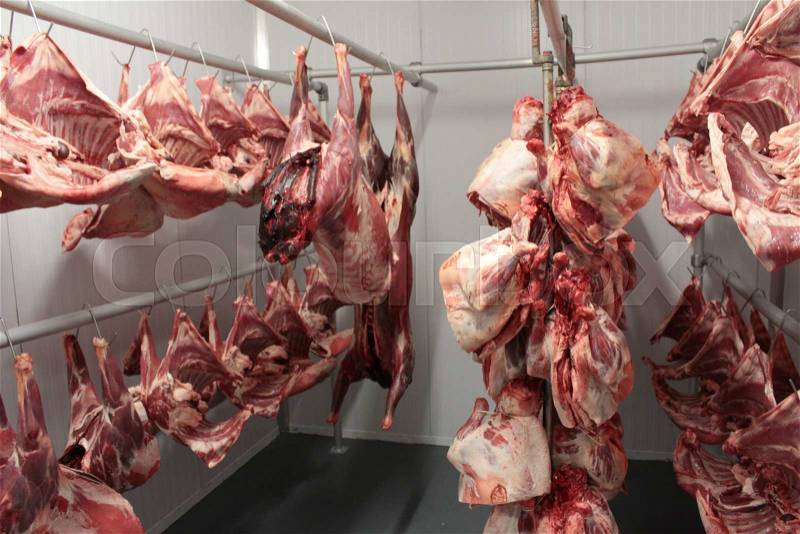 Butchering meat, stock photo